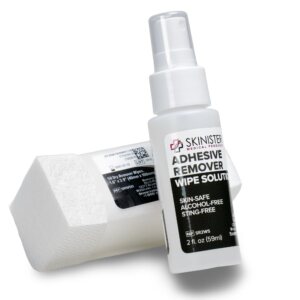 Skinister Medical Hybrid Adhesive Remover kit with 50 individually wrapped wipes and silicone-based adhesive spray for medical and ostomy use